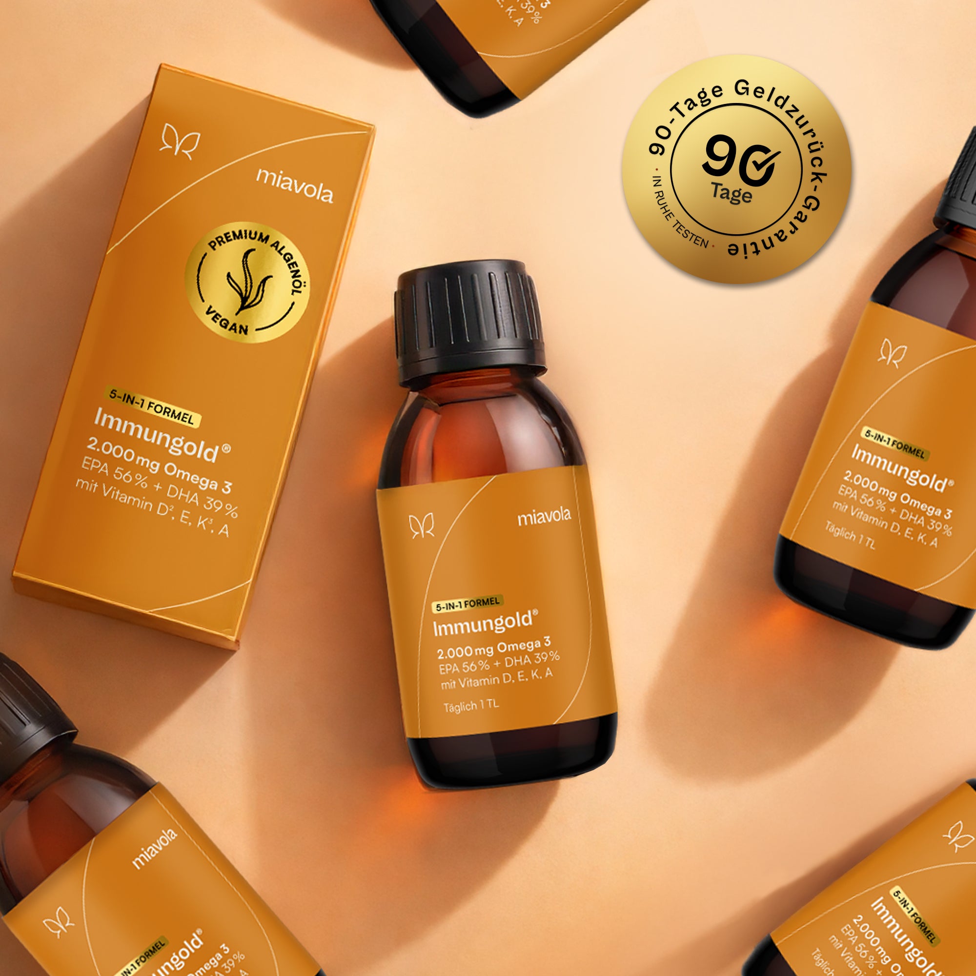 Mehrere Flaschen und Verpackungen Immungold mit dem Siegel „90-Tage-Geld-zurück-Garantie"